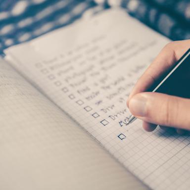 checklist written in a notebook